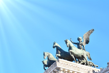 Wall Mural - Monument to the fatherland in Rome with statues, symbols of victory, flags and sacred fire. Italy.