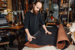 © agababjan - Working process in the leather workshop. Tanner in old tannery.