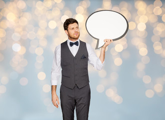 Wall Mural - man in suit holding blank text bubble banner