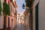Fototapeta Uliczki - The street of Cordoba in the sunny day, Cordoba, Andalusia, Spain