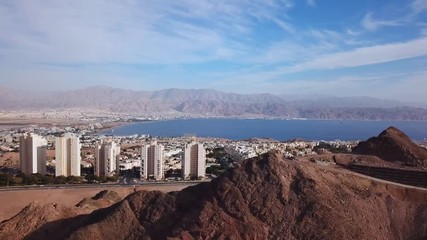 Wall Mural - Eilat, Israel - Aerial footage over Solomon's mountains, revealing Eilat's skyline and the red sea