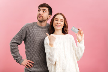 Wall Mural - Portrait of a young loving couple dressed in sweaters