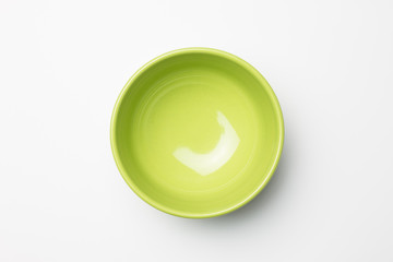 Wall Mural - Green bowl on white background