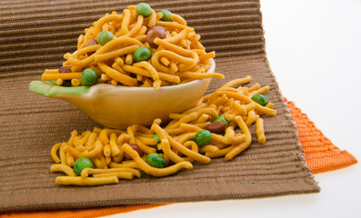 murukku or traditional indian snack on background.