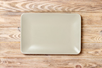 empty rectangular Plate on wooden table background