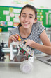 © highwaystarz - Portrait Of Female Pupil In Science Lesson Studying Robotics