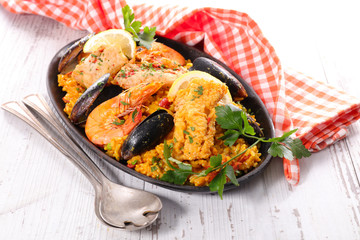 Wall Mural - paella with fish,shrimp and mussel