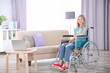 © Africa Studio - Teenage girl in wheelchair indoors