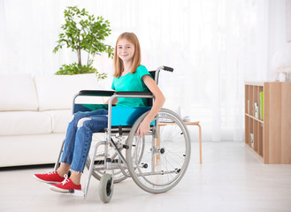 Wall Mural - Teenage girl in wheelchair indoors