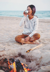 Canvas Print - Woman resting on beach.