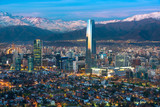 Fototapeta  - Panoramic view of Providencia and Las Condes districts with Costanera Center skyscraper, Titanium Tower and Los Andes Mountain Range, Santiago de Chile