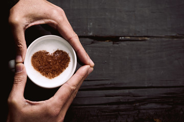 Poster - man with a cup of cappuccino with a heart