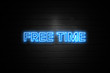 Free Time neon Sign on brickwall