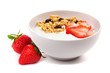 Yogurt with strawberries and granola in a white bowl. Side view, with berries isolated on a white background.