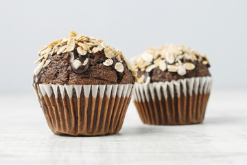 Sticker - Chocolate muffin decorated with oatmeal flakes.