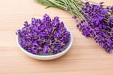 Fototapeta Lawenda - lavender / Porcelain bowl with lavender blossoms and bouquet with lavender