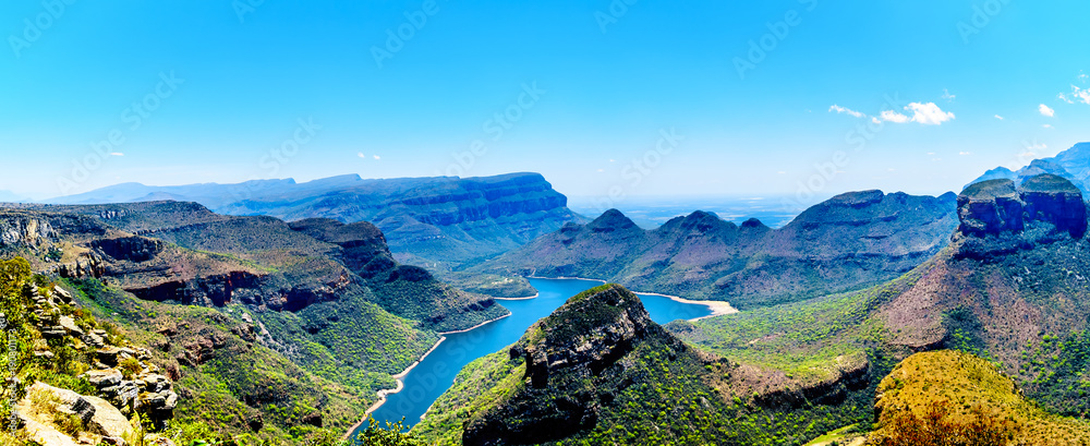 View of the highveld and the Blyde River Dam in the Blyde River Canyon Reserve, along the Panorama Route in Mpumalanga Province of South Africa - obrazy, fototapety, plakaty 