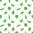 Seamless pattern with green fresh leaves on white background