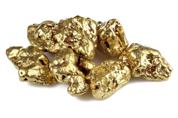 gold nuggets from Alaska isolated on white background