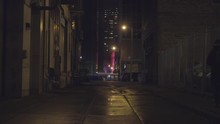 Dark Winter Alleyway With Mysterious Futuristic Glowing Building