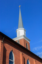 Church Steeple Against A Blue Sky
