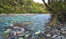 The Blue-green Water Of The Toaroha River Is Seen Smoothed Out In This Long Exposure Shot Taken Near Cedar Flat Hut On New Zealand's South Island.