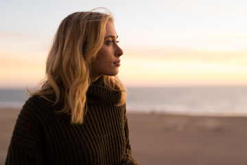 young caucasian woman looking far away