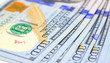 © Elya.Q - United States dollar banknotes. Cash money closeup photo. Currency background.
