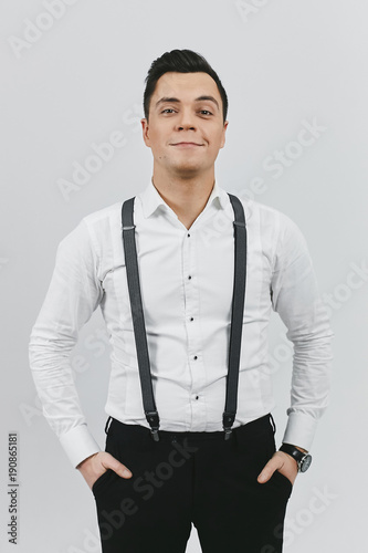 white button up shirt and black pants