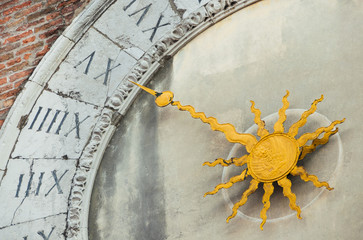 Wall Mural - Medieval Time. Detail of the ancient clock with Saint Mark Lion on the facade of San Giacomo di Rialto Church (Saint James of Rialto) in Venice old market , made in the 15th century