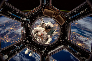 Wall Mural - astronaut in outer space