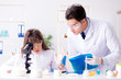 © Elnur - Two lab doctor testing food products