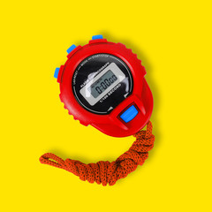 Sports equipment - Red Stopwatch yellow background