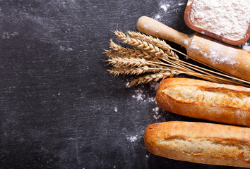 Sticker - bread with wheat ears and bowl of flour, top view