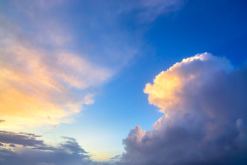Wall Mural - dramatic sunset sky approaching thunderstorm clouds.