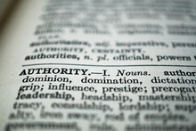 Closeup Of The Word Authority In The Dictionary
