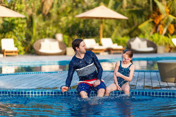 Sticker - Father and daughter at swimming pool