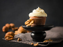 Carrot Cupcakes Or Muffins With Nuts On Dark Background