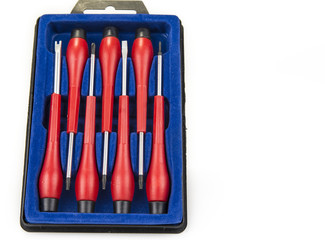 Set of pricise screwdrivers in the box on the white