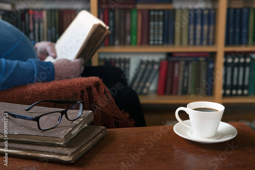 Sweet Moments Of Relaxation With Books And A Cup Of Coffee