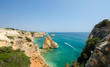 Views of golden cliffs and the Atlantic ocean from the observation deck. District Faro, Algarve, Southern Portugal