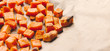 Roasted sweet potato cubes on a baking paper