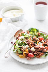 Poster - Vegan salad with tomatoes, beans and vegan sausage