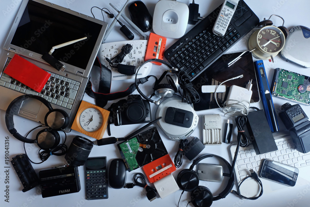 Pile of used Electronic Waste on white background, Reuse and Recycle concept, Top view  - obrazy, fototapety, plakaty 