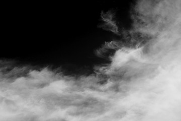 Wall Mural - clouds over black.