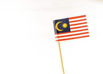 Set of toothpick with a small paper flag of Malaysia. Lined up and decorated on isolated white background. Bendera Malaysia, Flag.