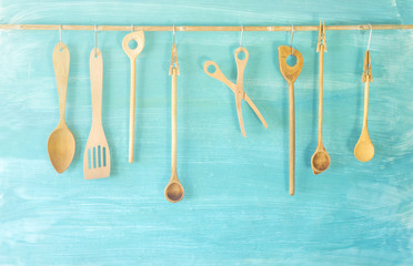 various vintage wooden kitchen utensils, free copy space