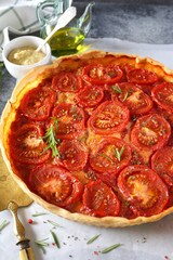 Red tomato vegetable pie with rosemary