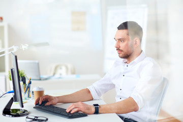 Sticker - businessman typing on computer keyboard at office