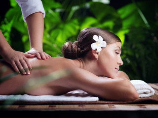 portrait of young beautiful woman in spa environment.  